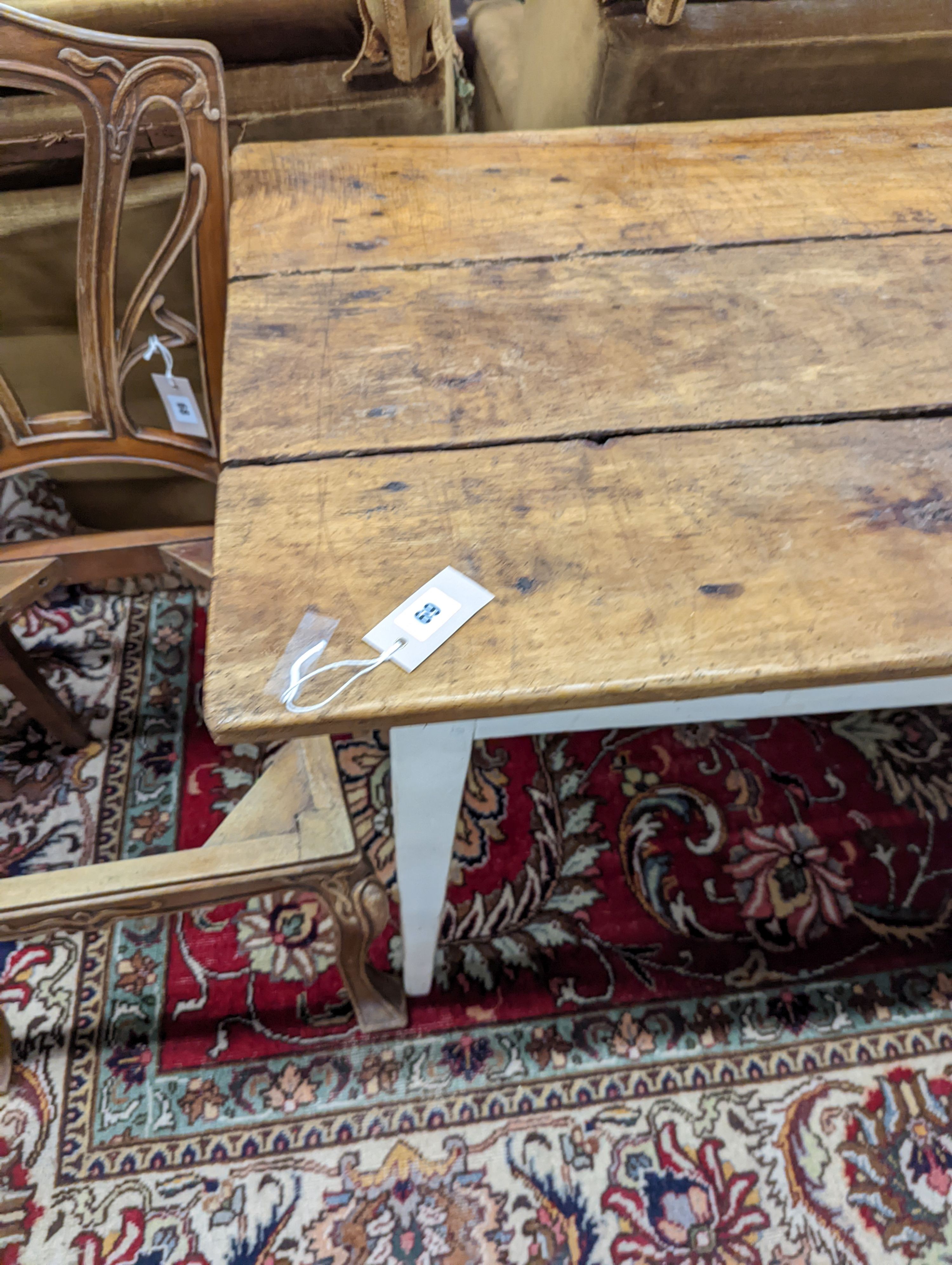 A 19th century French rectangular part painted fruitwood kitchen table. Length -214cm, Depth- 62cm, Height-76cm.